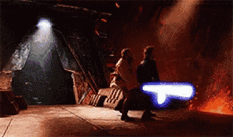 a pixelated image of a man holding a lightsaber with the letter t on it