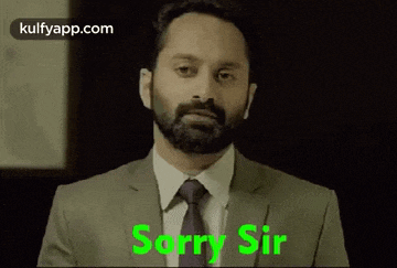 a man in a suit and tie is saying sorry sir .
