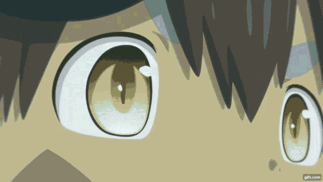 a close up of a person 's eyes with the website gifx.com in the lower right corner