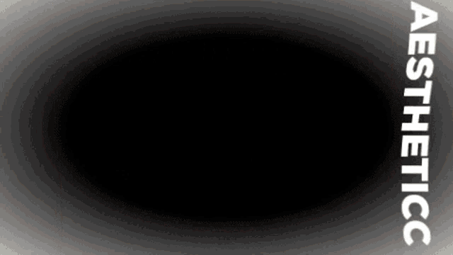 a black circle with the word aesthetic on the bottom