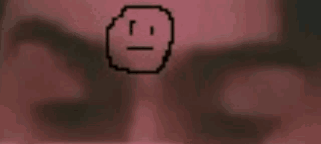 a close up of a man 's face with a pixelated face on it .