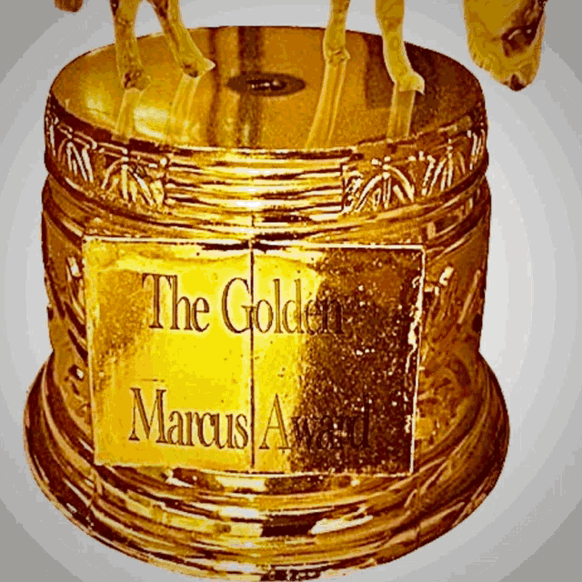 The Golden Marcus Award Trophy GIF