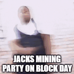 a man in a nun costume is holding a cardboard box and says `` jacks mining party on block day '' .