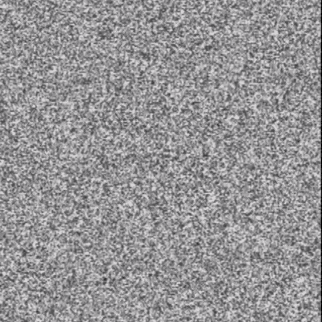 a close up of a gray carpet with a grainy texture