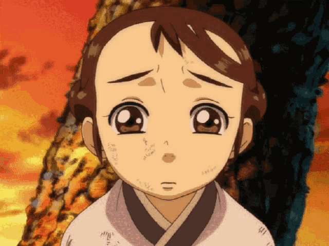 a cartoon girl with a tear running down her face