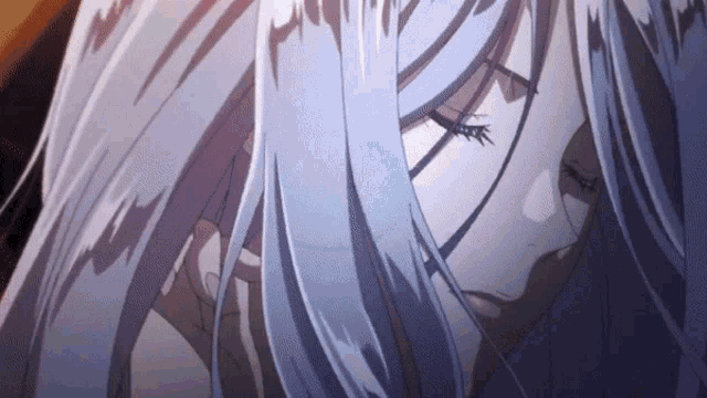a close up of a woman with long white hair