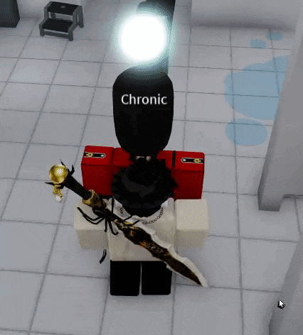 a soldier in a red uniform is standing on a tiled floor holding a sword in a video game .