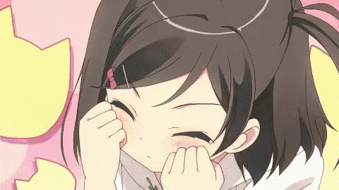 a girl with a ponytail is covering her face with her hand