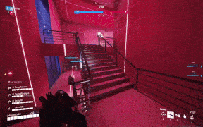 a screenshot of a video game shows a staircase leading up to a room with a purple wall