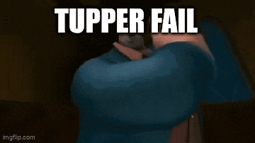 a person is holding a microphone and the words tupper fail are written on the screen .