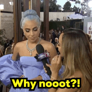 lady gaga is being interviewed by a woman holding a microphone and says " why nooot "