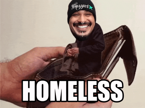 a hand is holding a wallet with a picture of a man and the words homeless