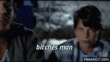 a man and a boy are sitting next to each other in a car and the boy is saying `` bitches man '' .