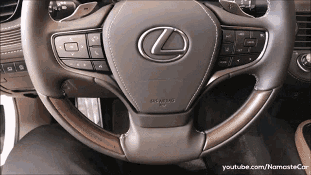 the steering wheel of a lexus car has a srs airbag on it