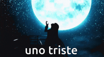 a silhouette of a person standing in front of a full moon with the words uno triste below it