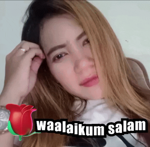 a picture of a woman with the words waalaikum salam written on it