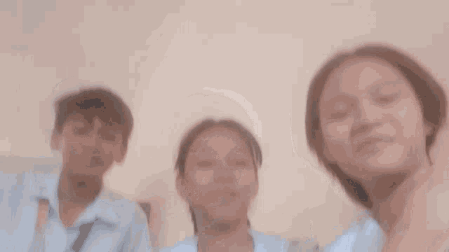 a girl wearing a lanyard that says ' philippines ' on it laughs with another girl