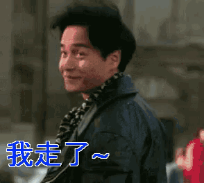 a man wearing a scarf and a jacket is smiling with chinese writing on the bottom