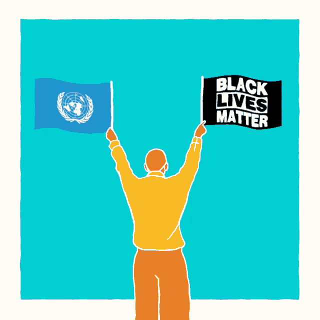 a man is holding up two flags and a sign that says black lives matter