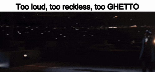 a man in a suit and hat with the words too loud too reckless too ghetto