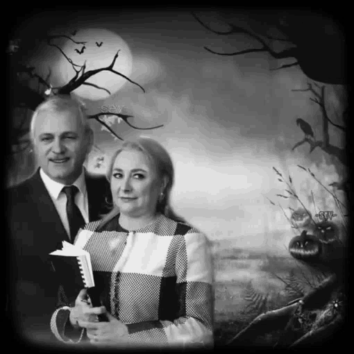 a man and a woman are posing for a picture with a halloween background