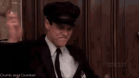 a man in a suit and tie is eating something .