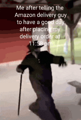 a man with a cane is dancing in front of a red building