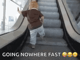 a baby is walking up an escalator with the words going nowhere fast written below it