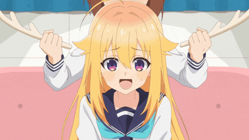 a girl with blonde hair and purple eyes is being tickled