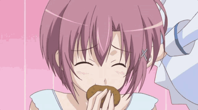 a girl with pink hair is smiling and eating a potato