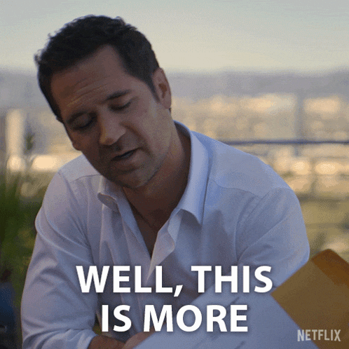 a man in a white shirt says well this is more on a netflix ad