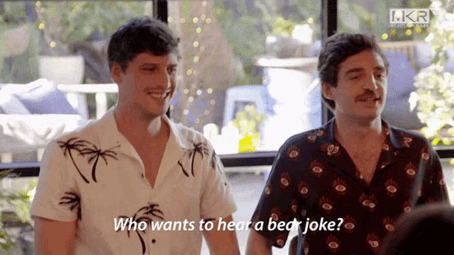 two men are standing next to each other and one of them says who wants to hear a bear joke