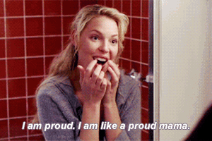a woman says i am proud i am like a proud mama in front of a mirror