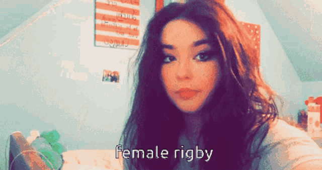 a girl taking a selfie with the words female rigby written below her