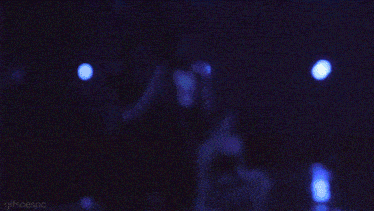a group of women are dancing on a stage with the words gifsaespa visible in the corner
