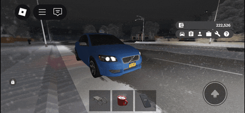 a blue car with a new york license plate is driving down a snowy road