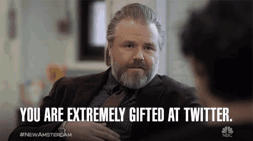 a man with a beard is talking to another man and the caption says you are extremely gifted at twitter