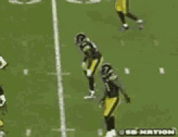 a group of football players on a field with the words sb nation on the bottom