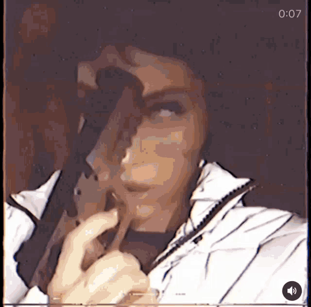 a close up of a person 's face with 0:07 on the bottom right