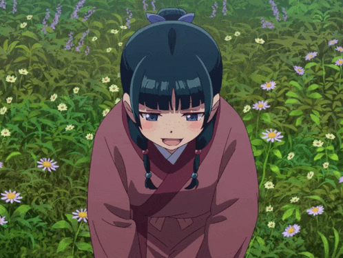 a girl in a kimono is kneeling down in a field of flowers