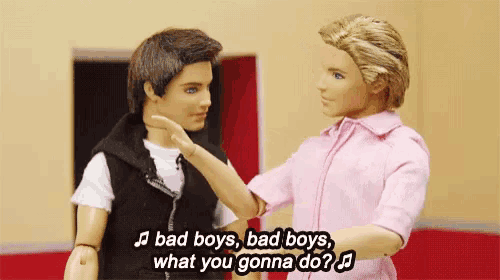 two barbie dolls are standing next to each other and one of them says " bad boys bad boys what you gonna do ? "
