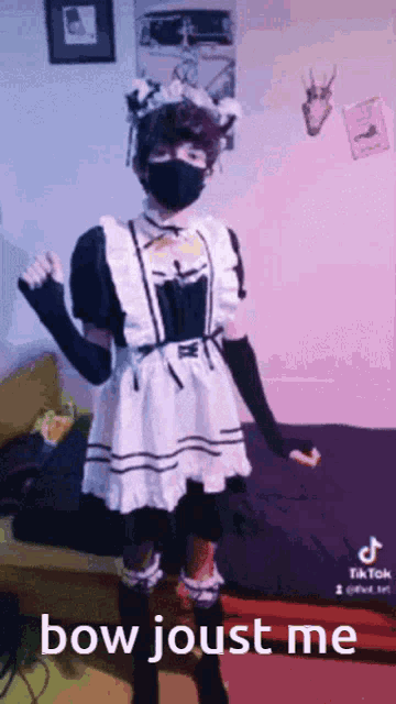 a person in a maid costume with the words bow joust me written on the bottom