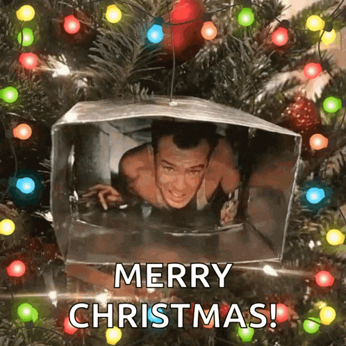 a picture of a man in a box with the words merry christmas