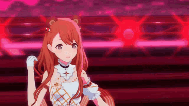 a girl with red hair is standing in front of a red background .