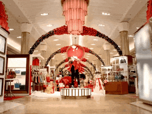 a christmas display in a store with a snowman