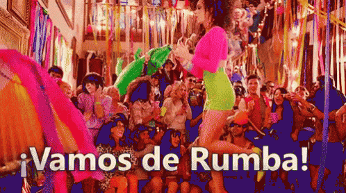 a woman is dancing in front of a crowd with the words vamos de rumba written below her .