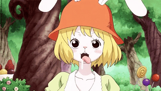 a cartoon girl wearing an orange hat and sticking her tongue out