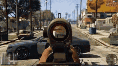 a person is playing a video game with a billboard in the background that says gorilla cheez