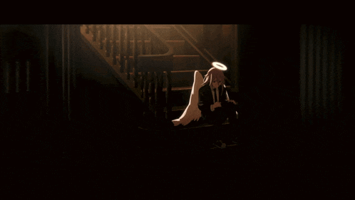 a person with angel wings and a halo on their head sits on a set of stairs
