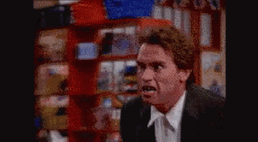arnold schwarzenegger is making a funny face in a store